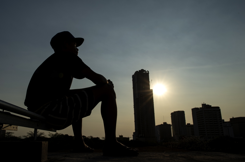 This photo taken on March 14, 2019 shows a silhouette of a boy that was once held at a juvenile detention centre, during an interview with AFP at an unspecified location in Manila. AFP / Noel Celis