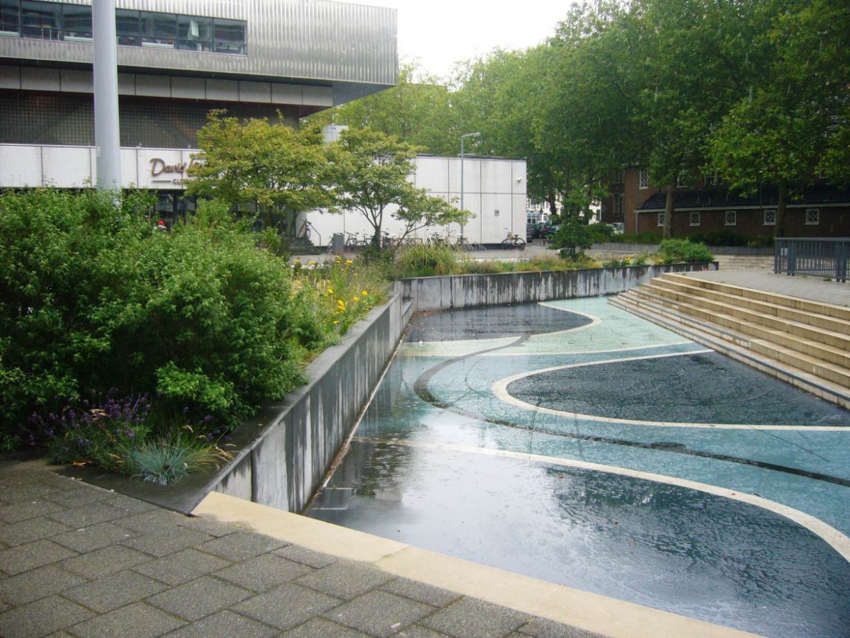 Rain collects in the main water basin of the Benthemplein public 