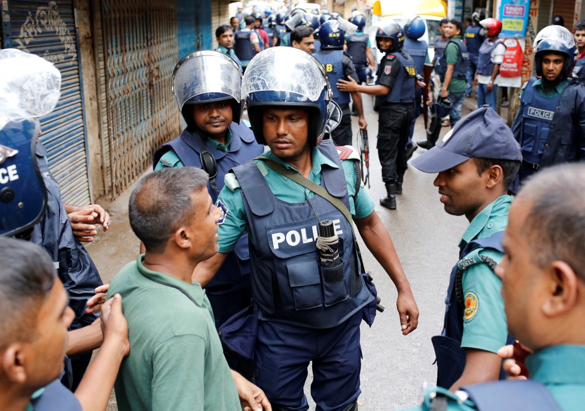 Representative image: Bangladesh Police keep the public away near the site of an earlier police operation on the outskirts of Dhaka, July 26, 2016. Reuters/Mohammad Ponir Hossain