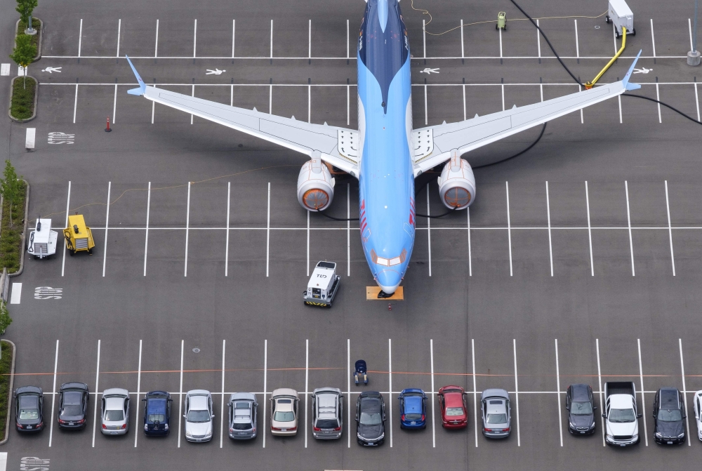 In this file photo taken on June 27, 2019, a Boeing 737 MAX airplane is stored on an employee parking lot adjacent to Boeing Field in Seattle, Washington. (AFP / GETTY IMAGES NORTH AMERICA / STEPHEN BRASHEAR)