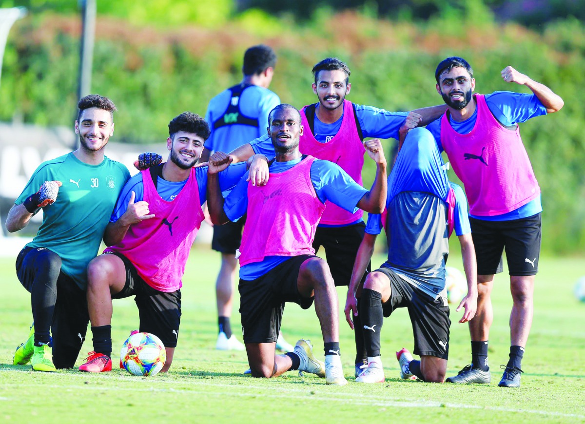 Al Sadd players pose for a photograph during their overseas training camp in Olot, Spain, yesterday. Pictures: @AlsaddSC, @ummsalalsc and @ALGHARAFACLUB 