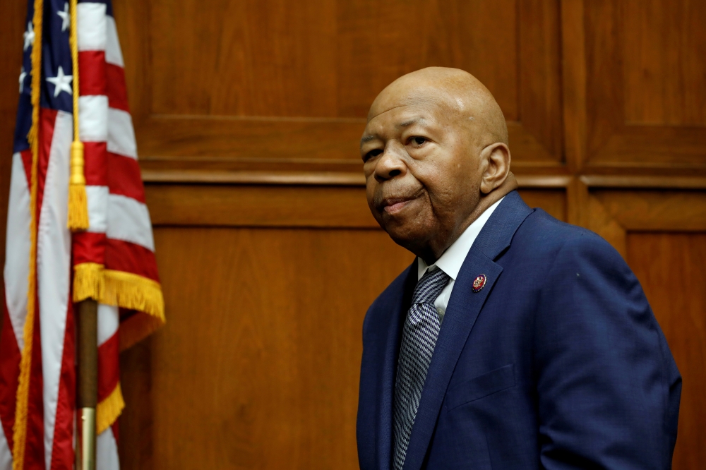 FILE PHOTO: House Oversight and Reform Committee chairman Rep. Elijah Cummings (D-MD) arrives at the committee contempt votes on whether to find Attorney General William Barr and Commerce Secretary Wilbur Ross in contempt of Congress for withholding Censu