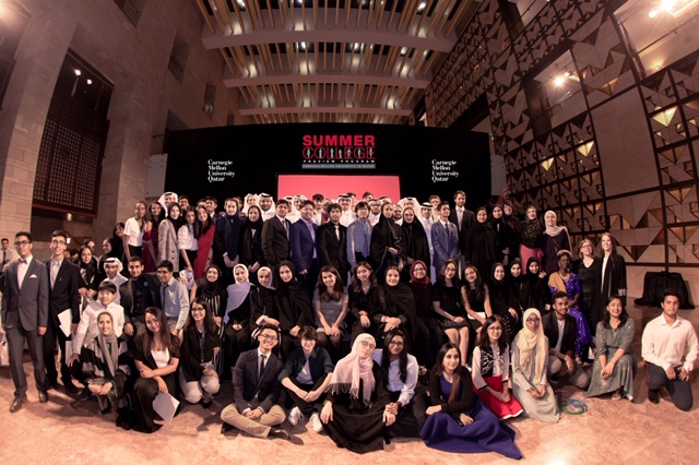 The secondary school students from Qatar posing for a group photo.