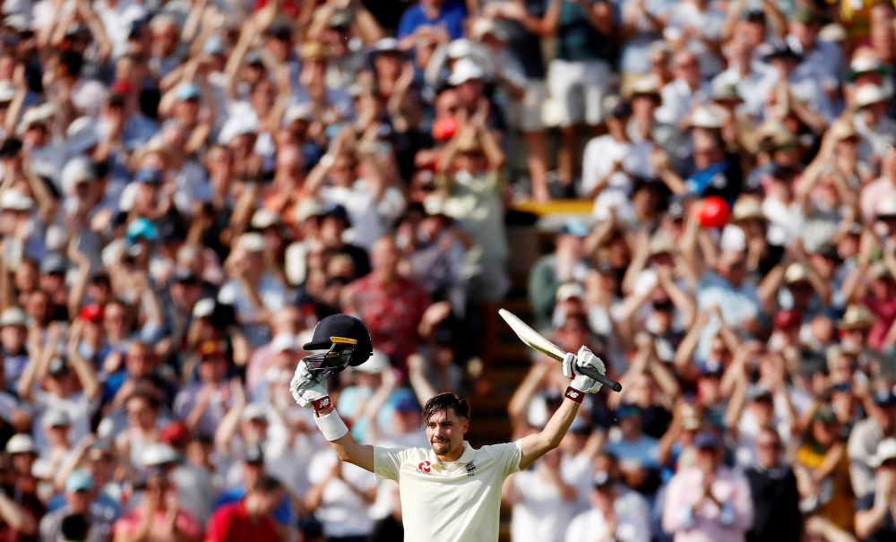 England's Rory Burns celebrates his century (Reuters/Andrew Boyers)