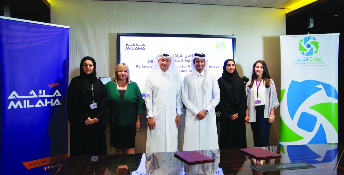 Saleh Abdullah Al Haroon (third left), Executive Vice-President of Support Services at Milaha; and Abdallah Al Suwaidi, Chairman of Elite Paper Recycling (third right), and other officials during the signing ceremony. 