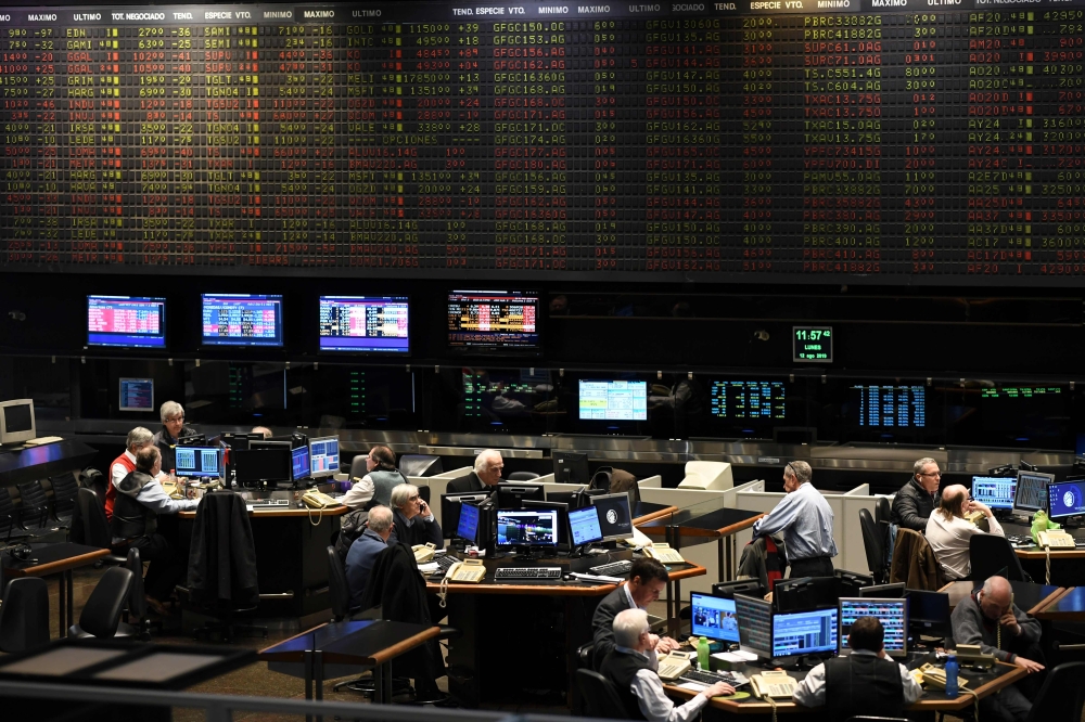 Traders are seen at the Stock Exchange in Buenos Aires on August 12, 2019.(AFP / RONALDO SCHEMIDT)