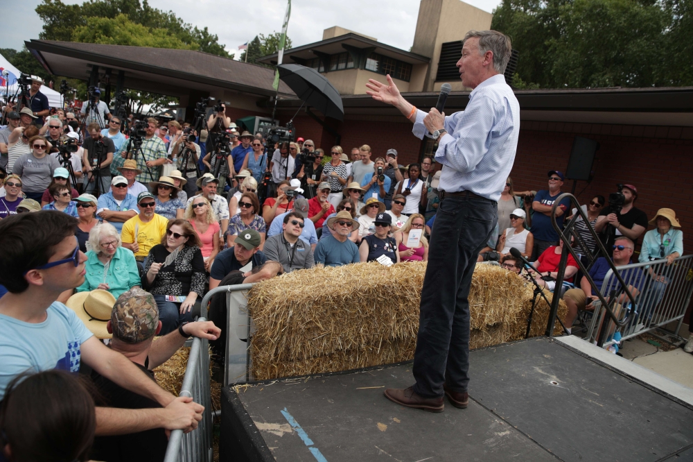 Democratic presidential candidate and former Governor of Colorado John Hickenlooper delivers a campaign speech at the Des Moines Register Political Soapbox at the Iowa State Fair on August 10, 2019 in Des Moines, Iowa. (Alex Wong/Getty Images/AFP)