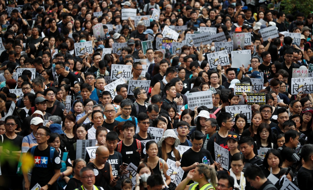 Teachers protest against the extradition bill during a rally organised by Hong Kong Professional Teachers' Union in Hong Kong, China August 17, 2019. REUTERS/Kim Hong-Ji