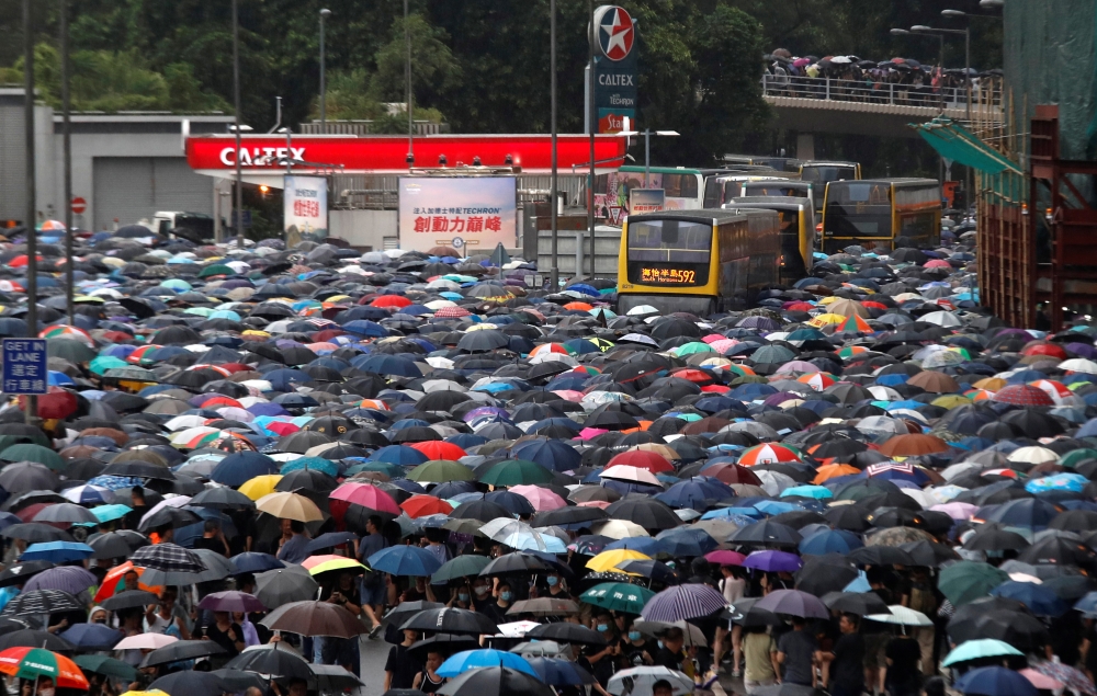 Anti-extradition bill protesters march to demand democracy and political reforms, in Hong Kong, China August 18, 2019. REUTERS/Tyrone Siu