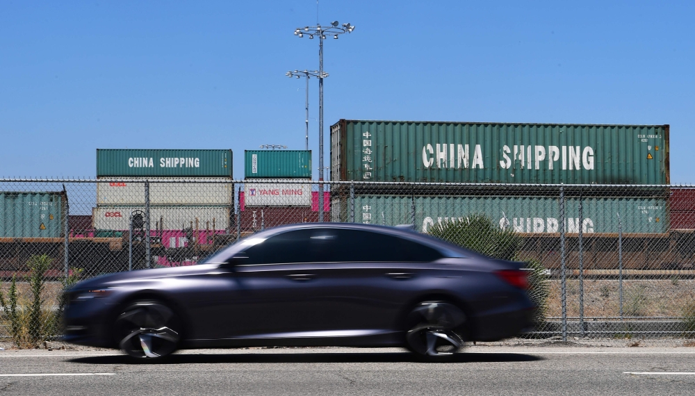 China Shipping containers are pictured at Port of Long Beach on August 23, 2019 in Long Beach, California.  AFP / Frederic J. BROWN