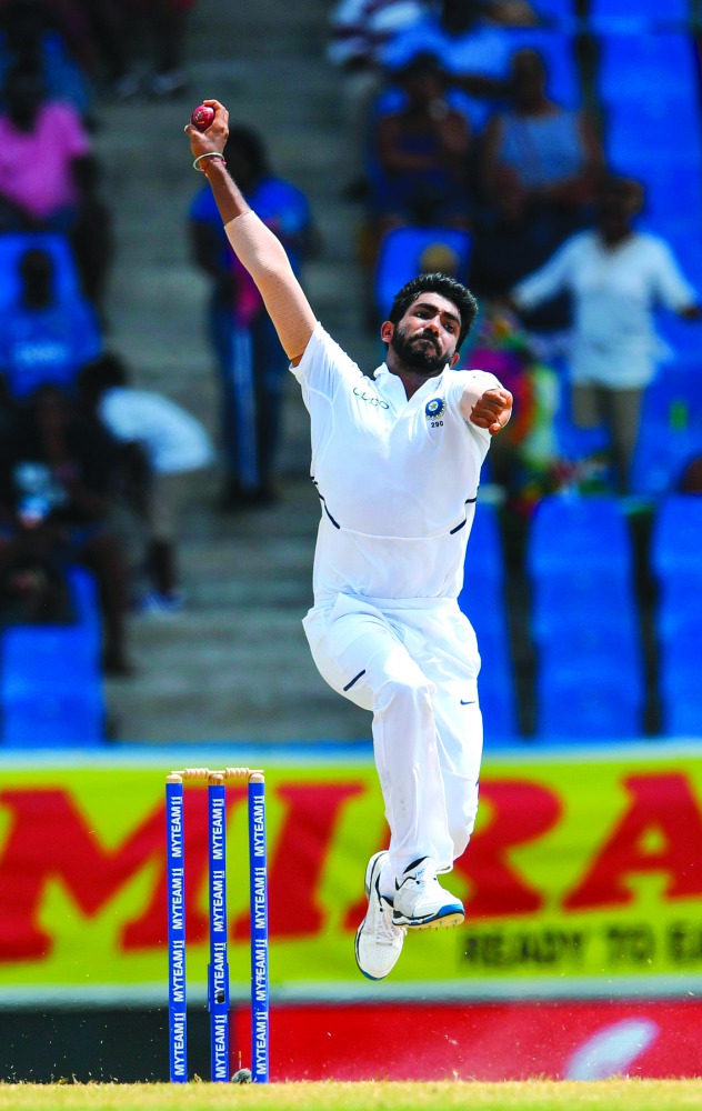 Jasprit Bumrah of India is seen bowling during day 4 of the 1st Test between West Indies and India at Vivian Richards Cricket Stadium in North Sound, Antigua and Barbuda, on August 25, 2019. / AFP / Randy Brooks
