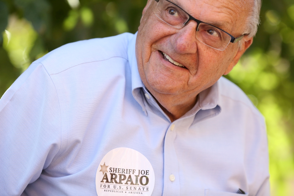 FILE PHOTO: Former Sheriff Joe Arpaio campaigns in his bid to become the Republican nominee for an open Senate seat in Wickenburg, Arizona, U.S. August 24, 2018. REUTERS/Conor Ralph/File Photo
