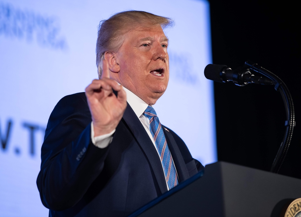 (FILES) In this file photo taken on July 23, 2019 US President Donald Trump addresses the Turning Point USA’s Teen Student Action Summit 2019 in Washington, DC. AFP / NICHOLAS KAMM