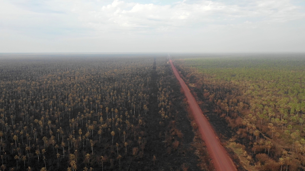 Aerial view of the damage caused by wildfires in Otuquis National Park, in the Pantanal ecoregion of southeastern Bolivia, on August 27, 2019.   AFP / Pablo COZZAGLIO
