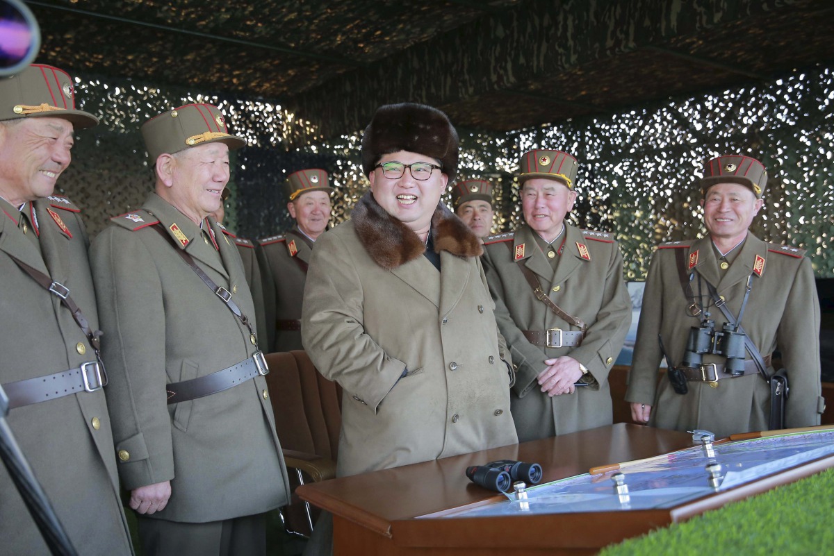 North Korea’s Kim Jong Un with military officers as he observes a drill in a photo by Korean Central News Agency on March 25 2016. KCNA/REUTERS