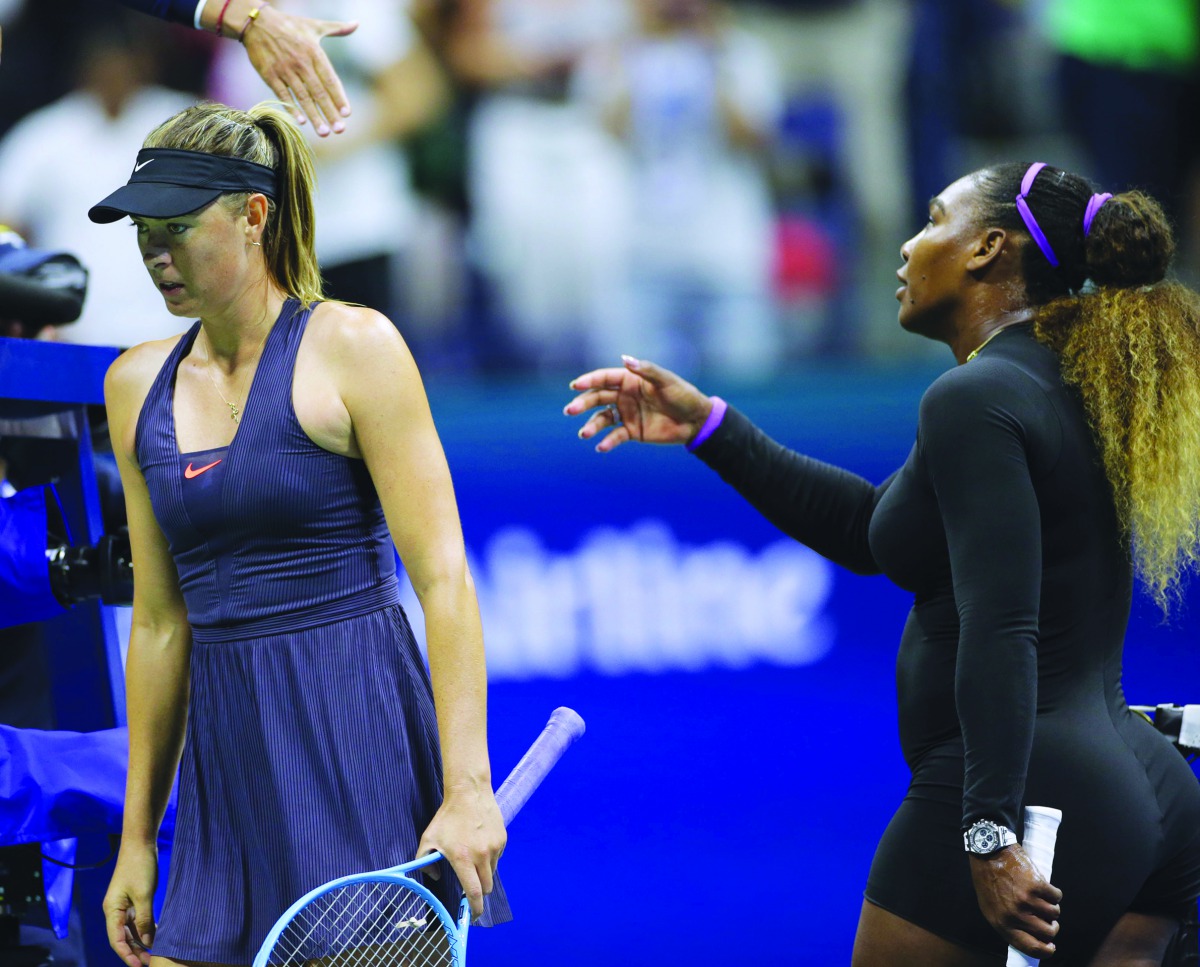 Serena Williams of the United States (right) and Maria Sharapova of Russia react after a first round match on day one of the 2019 U.S. Open tennis tournament at USTA Billie Jean King National Tennis Center. Credit: Jerry Lai-USA TODAY Sports