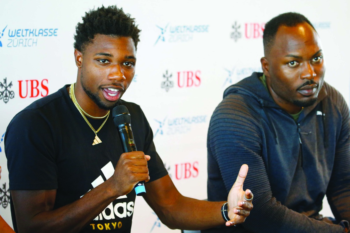 Noah Lyles of the US and Alex Wilson (R) of Switzerland during a press conference. Reuters/Arnd Wiegmann 