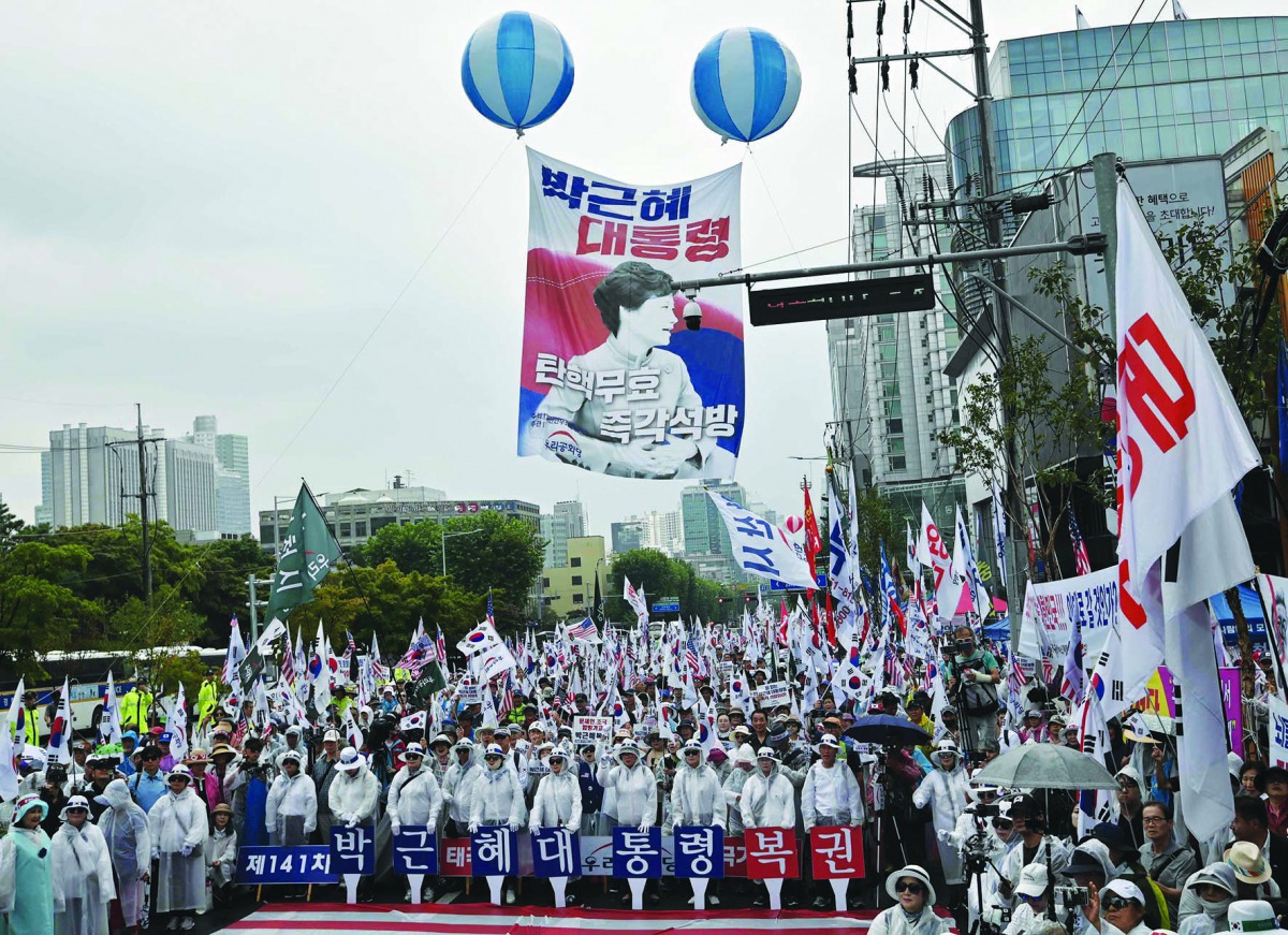 Supporters of South Korea's former president Park Geun-hye attend a protest demanding her release from prison, outside the Supreme Court in Seoul on August 29, 2019. South Korea's top court on August 29 set aside former president Park Geun-hye's convictio
