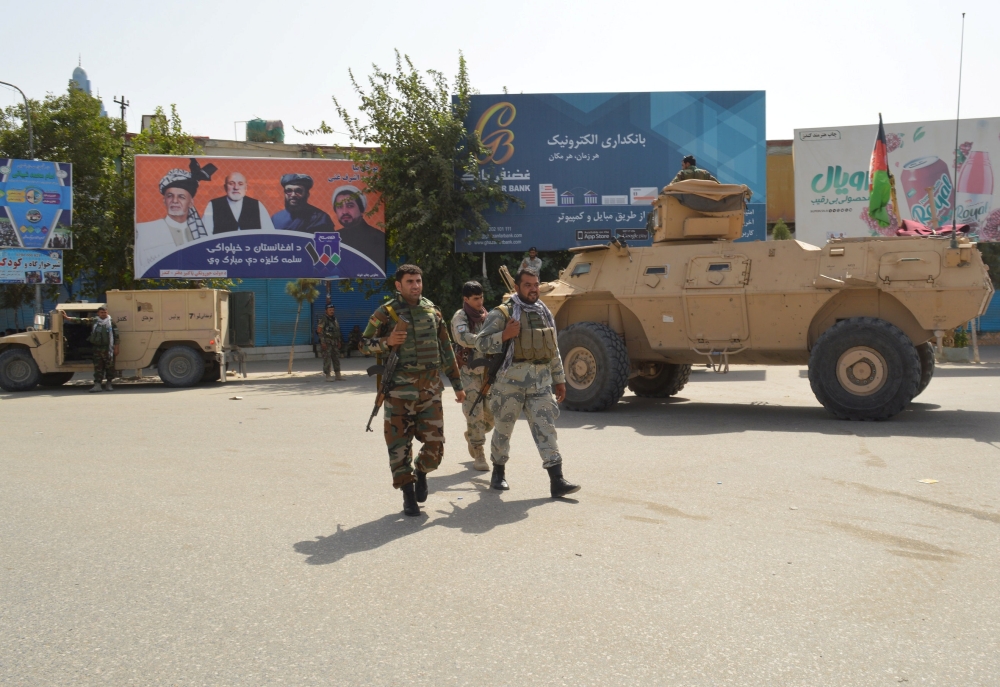 Afghan security forces patrol an area during a Taliban attack in the downtown of Kunduz city, Afghanistan August 31, 2019. REUTERS