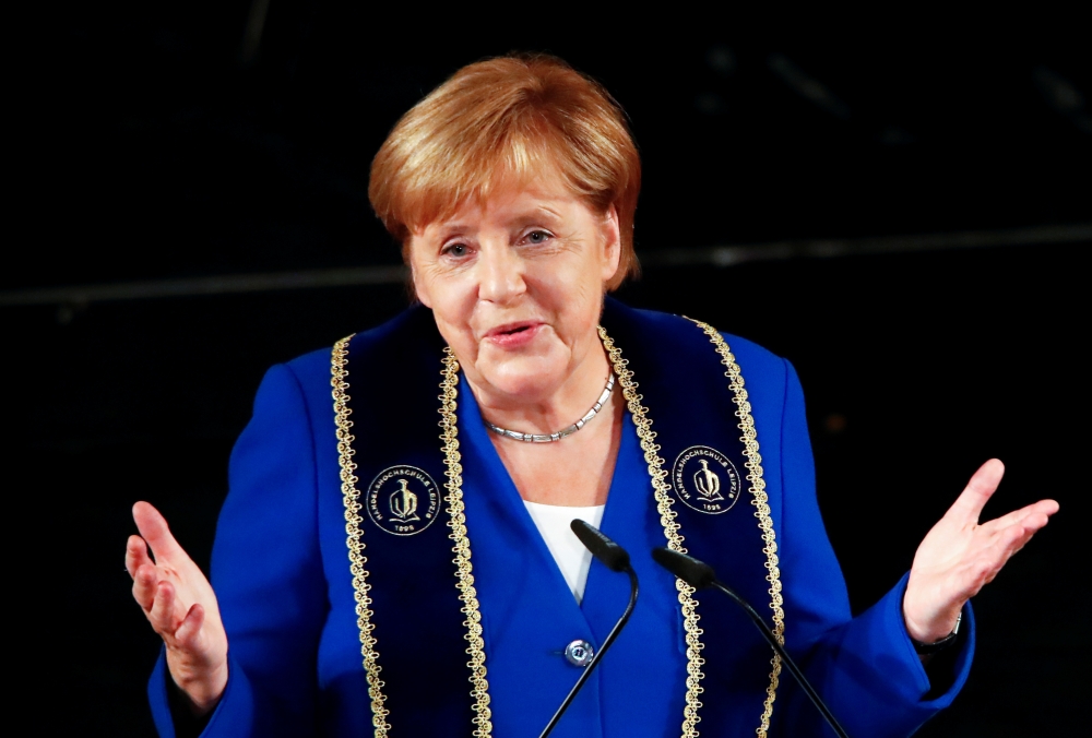 German Chancellor Angela Merkel speaks after receiving an honorary doctorate by HHL Leipzig Graduate School of Management during a ceremony in Leipzig Opera House in Leipzig, Germany, August 31, 2019. REUTERS/Wolfgang Rattay