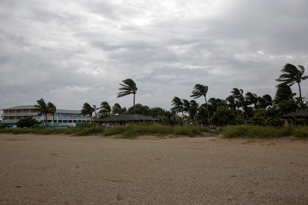 Wind gusts begin to gain strength at Fort Pierce Jetty Park with Hurricane Dorian approaching the coast in Florida on September 2, 2019.  / AFP / Adam DelGiudice 