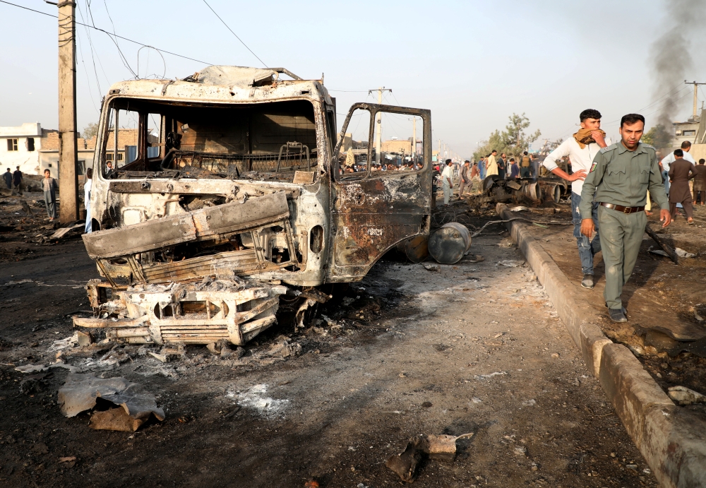 Afghan policemen inspect the site of a blast in Kabul, Afghanistan, September 3, 2019. REUTERS/Omar Sobhani