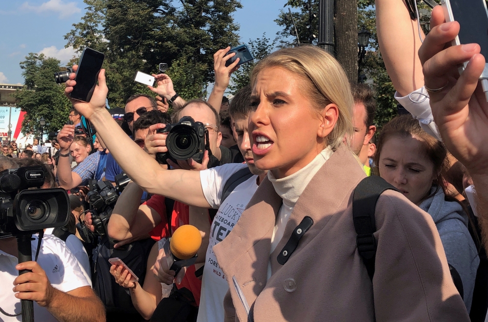 FILE PHOTO: Russian opposition figure Lyubov Sobol delivers a speech during a rally to demand authorities allow opposition candidates to run in the upcoming local election and release protesters, who were detained during recent demonstrations, in Moscow, 