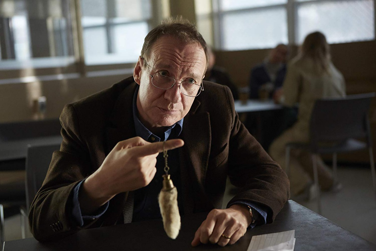 The movie, directed by Atom Egoyan, begins with Veronica, a former high school music teacher recently released from jail, meeting a priest to discuss her father's funeral.