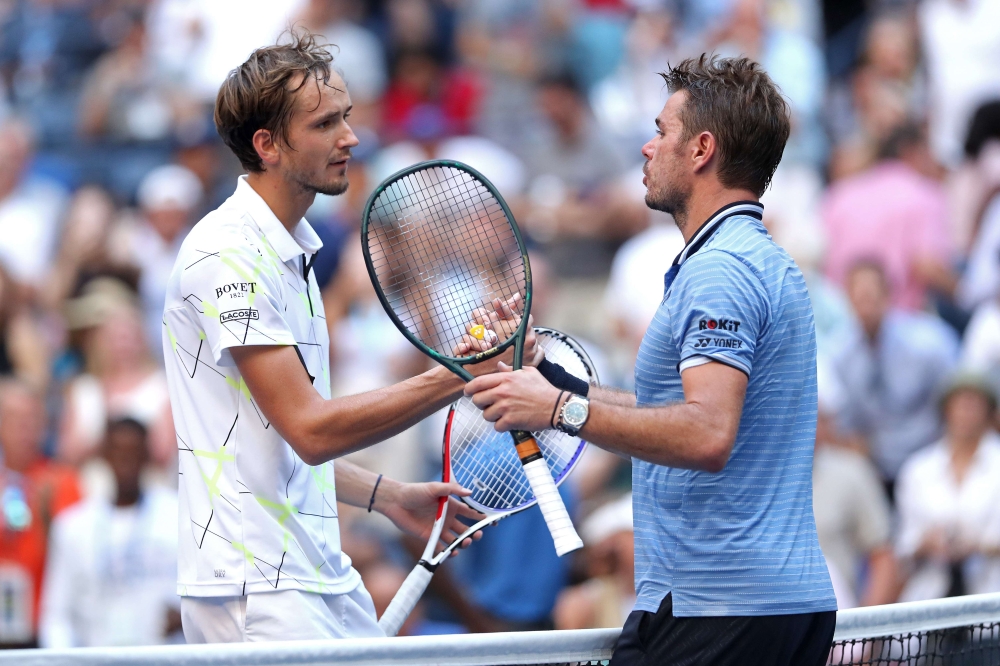 Daniil Medvedev of Russia shakes hands with Stan Wawrinka of Switzerland after their Men's Singles quarterfinal match on day nine of the 2019 US Open at the USTA Billie Jean King National Tennis Center on September 03, 2019 in the Queens borough of New Yo