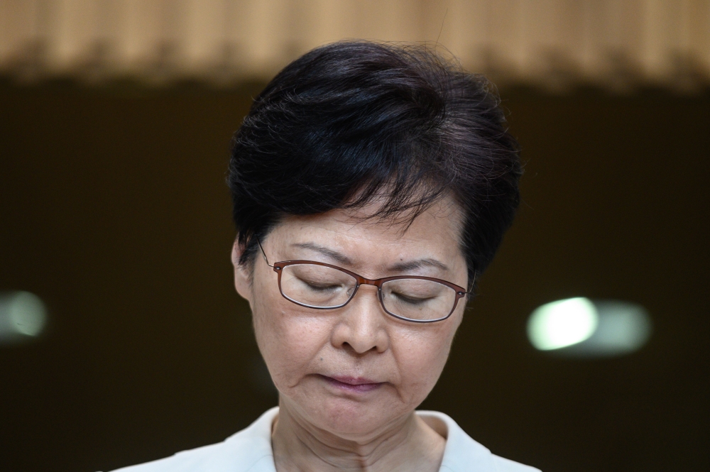Hong Kong Chief Executive Carrie Lam waits for questions from the media at a press conference in Hong Kong on September 5, 2019, a day after she announced the withdrawal of a loathed extradition bill. AFP / Philip Fong 