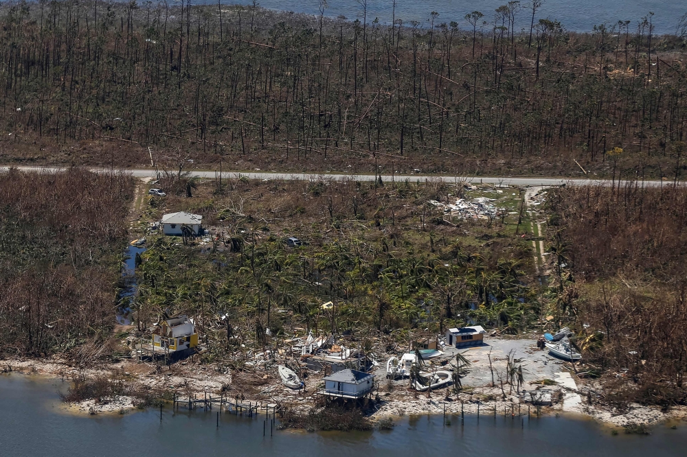 TOPSHOT - An aerial view of floods and damages from Hurricane Dorian on Freeport, Grand Bahama on September 5, 2019. / AFP / Adam DelGiudice 