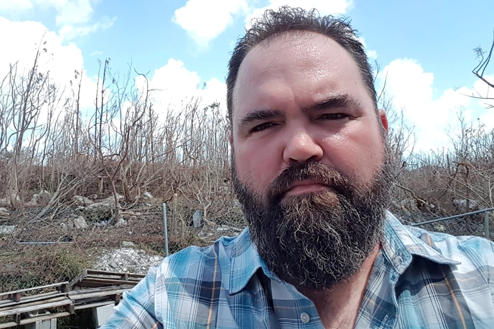 Photojournalist Dante Carrer, who covered Hurricane Dorian for Reuters from within its eye, poses for a selfie in the Abaco Island city of Marsh Harbour, Bahamas September 6, 2019. Reuters/Dante Carrer
 