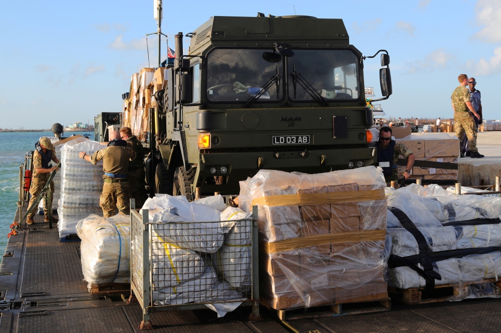 Humanitarian and Disaster Relief (HADR) teams from the Royal Fleet Auxiliary's RFA Mounts Bay deliver supplies after Hurricane Dorian, to the Island of Great Abaco in the Bahamas, September 5, 2019. LPhot Paul Halliwell/Royal Navy/via Reuters 