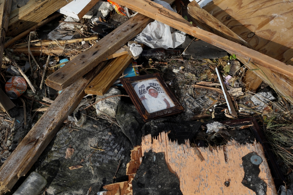 A portrait is seen at the Mudd neighborhood, devastated after Hurricane Dorian hit the Abaco Islands in Marsh Harbour, Bahamas, September 6, 2019. Reuters/Marco Bello 