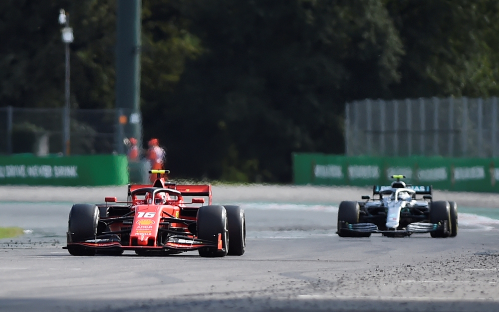 Ferrari's Charles Leclerc and Mercedes' Valtteri Bottas in action during the race REUTERS/Massimo Pinca