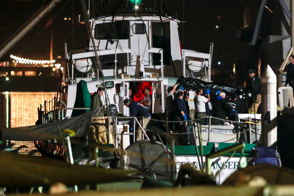 Rescue personnel return to shore with the victims of a pre-dawn fire that sank a commercial diving boat off the coast of Santa Barbara, California, September 2, 2019. Reuters/Kyle Grillot