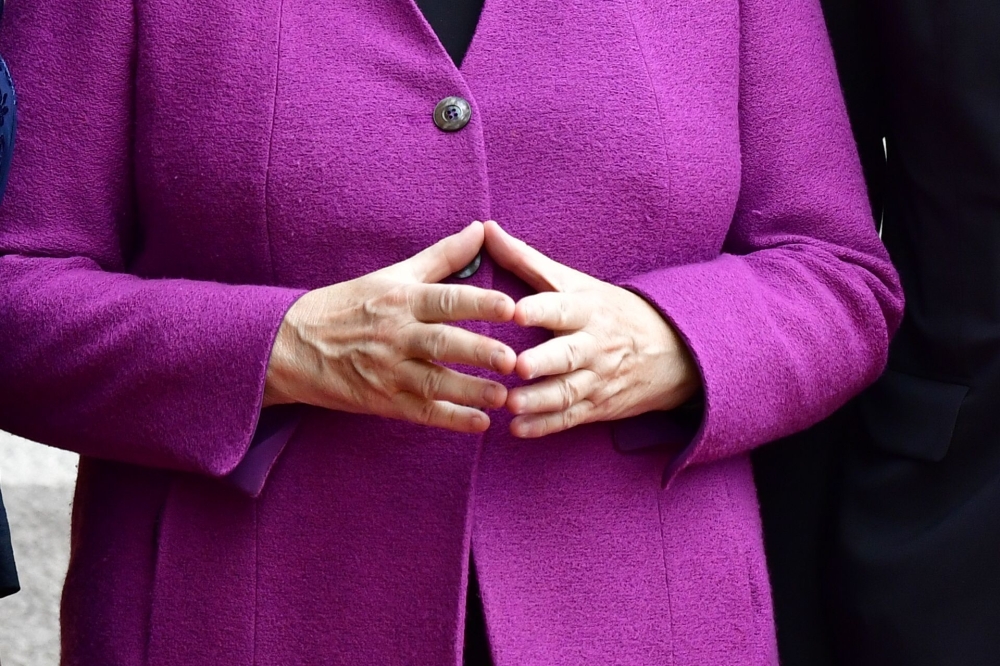 Chancellor Angela Merkel faced a particularly delicate set of policy goals when she visited China this week with a delegation of German company executives: maintaining that hard line on Beijing while urging a resolution of the trade war and continuing to 