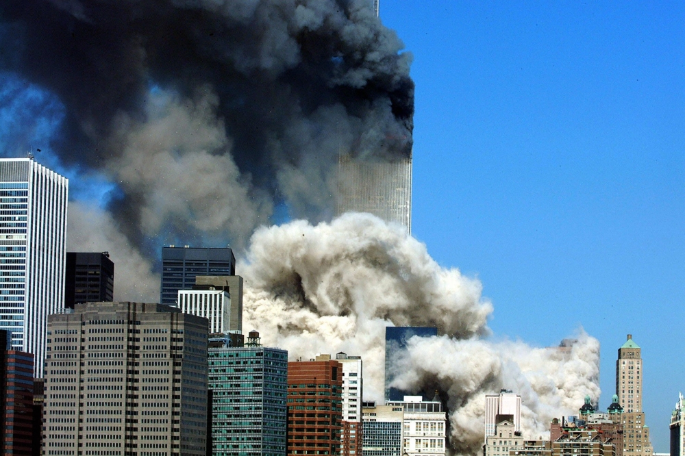 In this file photo taken on September 11, 2001, smoke billowing after the first of the two towers of the World Trade Center collapses in New York City.  AFP / Henny Ray Abrams