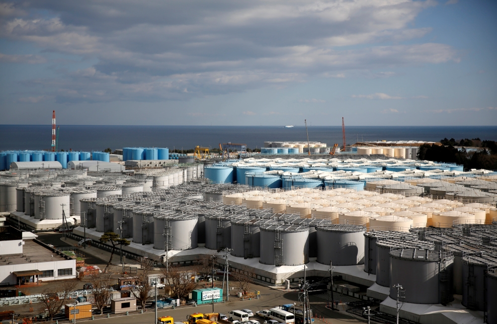 FILE PHOTO: Storage tanks for radioactive water are seen at Tokyo Electric Power Co's (TEPCO) tsunami-crippled Fukushima Daiichi nuclear power plant in Okuma town, Fukushima prefecture, Japan February 18, 2019. REUTERS/Issei Kato/File Photo
