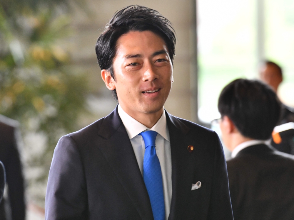 Japan's newly-appointed Environment and Nuclear Disaster Minister Shinjiro Koizumi enters the prime minister's official residence in Tokyo on September 11, 2019. AFP / Toshifumi Kitamura 