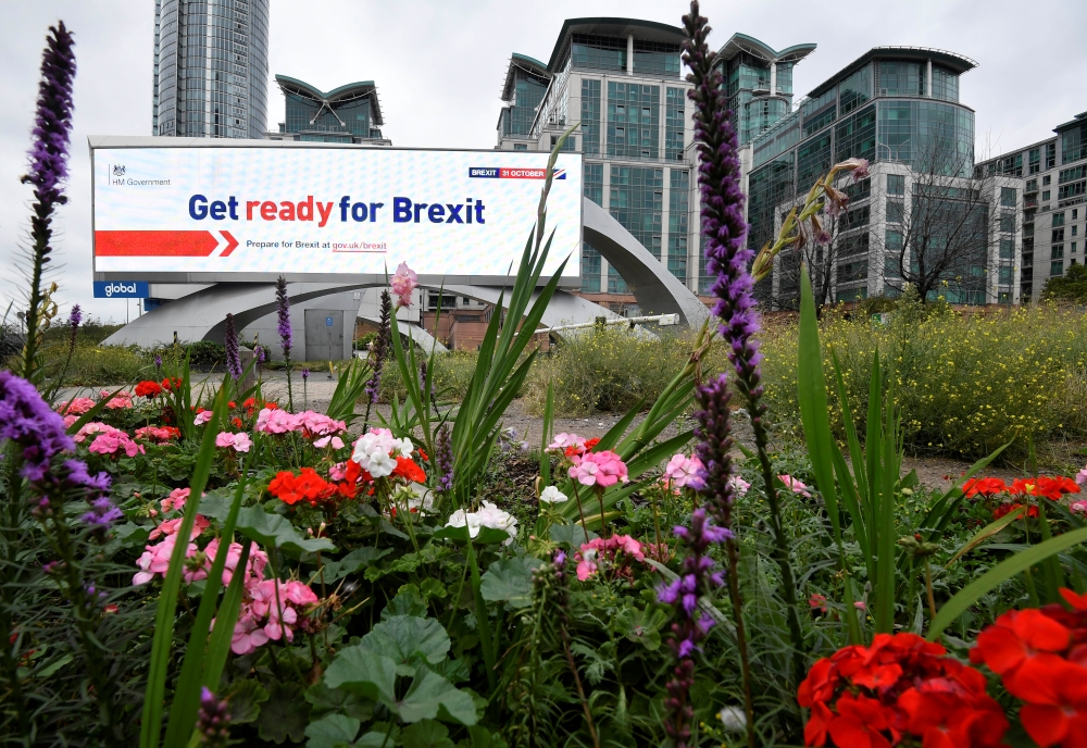 An electronic billboard displaying a British government Brexit information awareness campaign advertisement is seen in London, Britain, September 11, 2019. REUTERS/Toby Melville