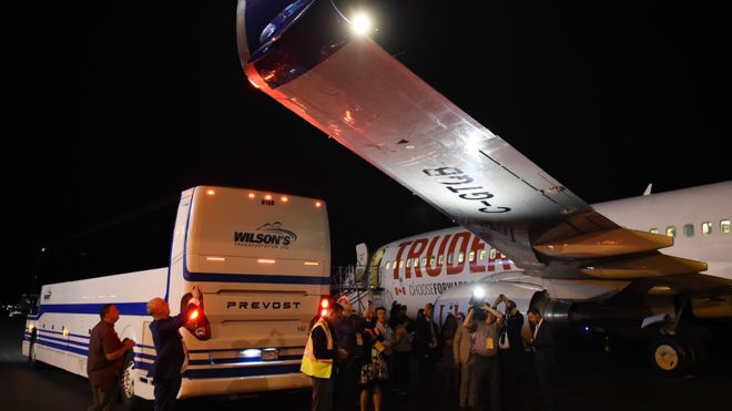 The media bus drove under and scraped the wing of the plane, they said. Trudeau had already left the airport. Pictures on social media showed a gash underneath the wing.