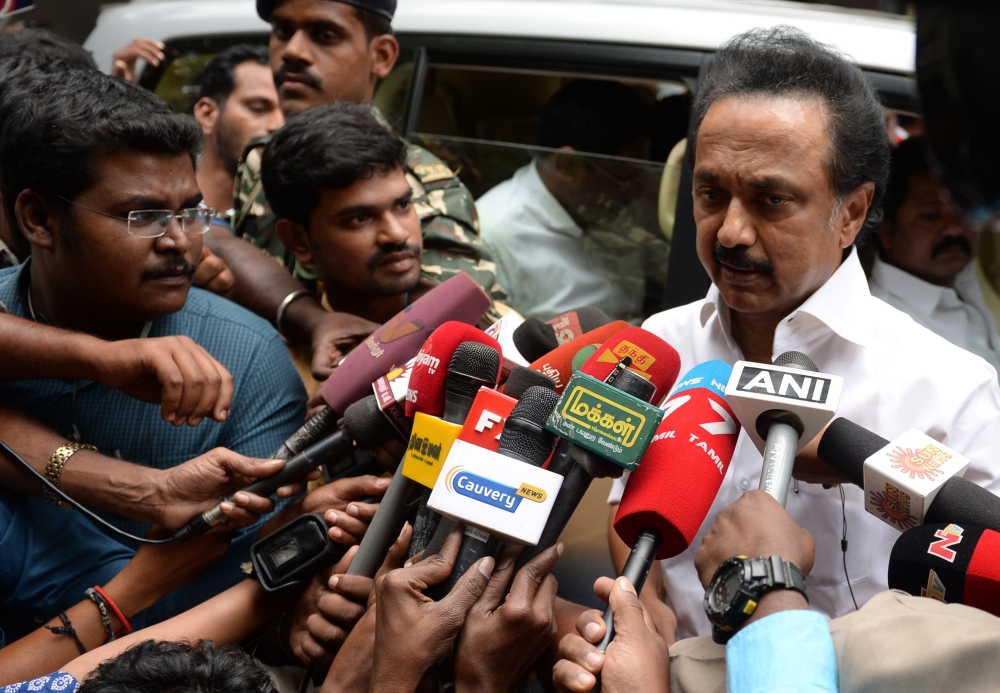 DMK party working President MK Stalin talks to media at the home of party leader Karunanidhi in Chennai on December 21, 2017. AFP / Arun Sankar 