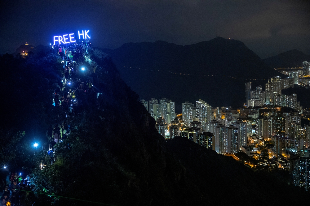 Anti-government protesters gather at Lion Rock, in Hong Kong, China September 13, 2019. REUTERS/Athit Perawongmetha 
