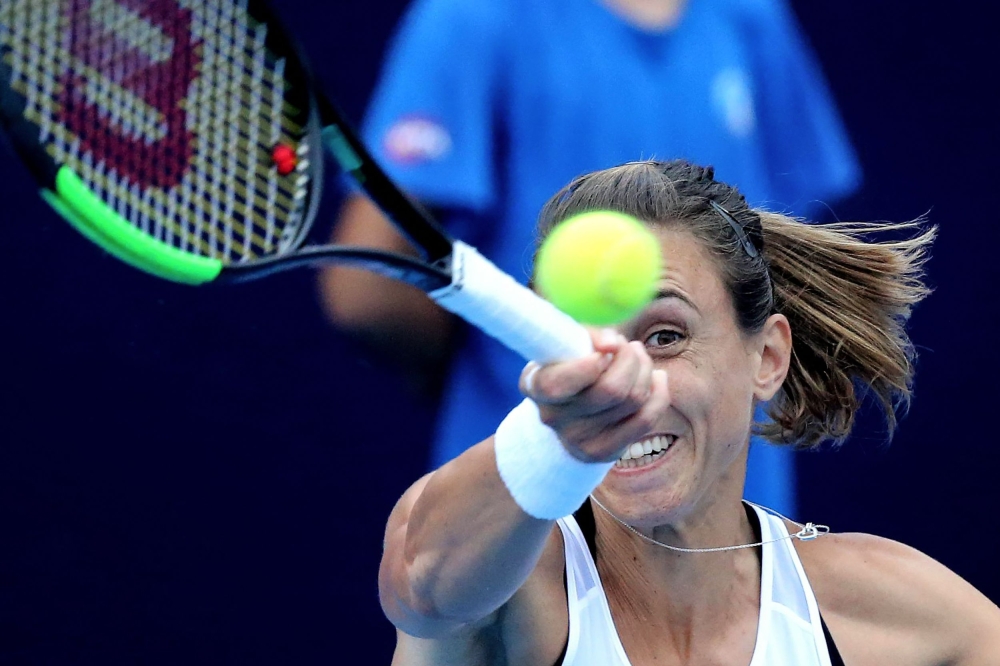 Petra Martic of Croatia hits a return during her women's singles semi-final match against Kristina Mladenovic of France at the Zhengzhou Open tennis tournament in Zhengzhou in China's central Henan province on September 14, 2019. AFP 