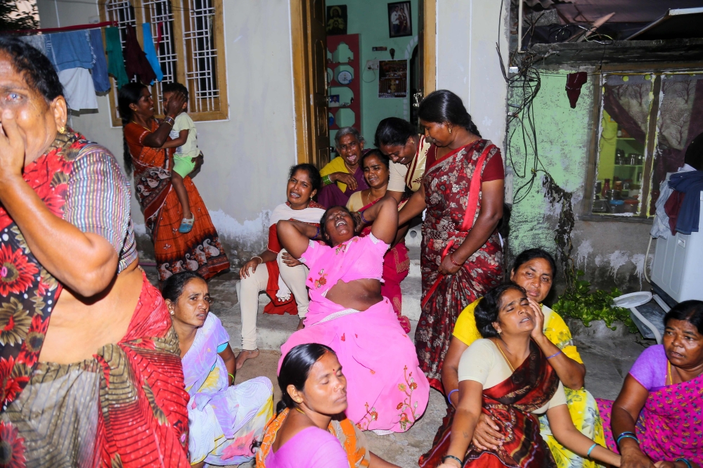 Relatives mourn the victims who died or disappeared in a boat accident at the Godavari river near Rajahmundry in Andhra Pradesh state, at Kadipikonka village in Warangal district of Telengana state on September 15, 2019. AFP / STR