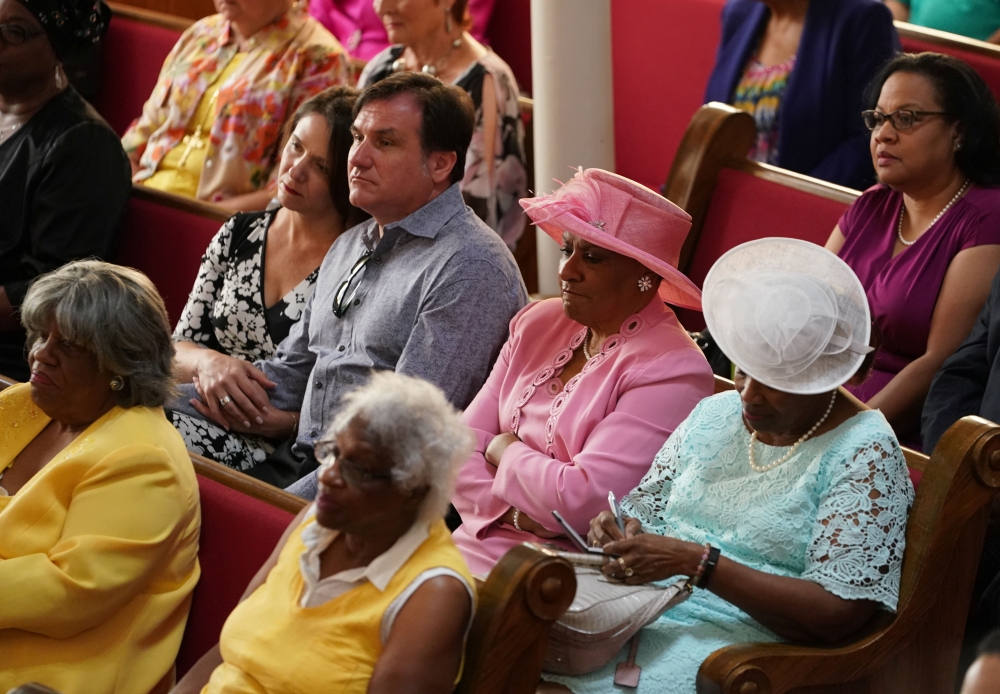 Church members aand some supporters of Joe Biden listen to his speach at the 