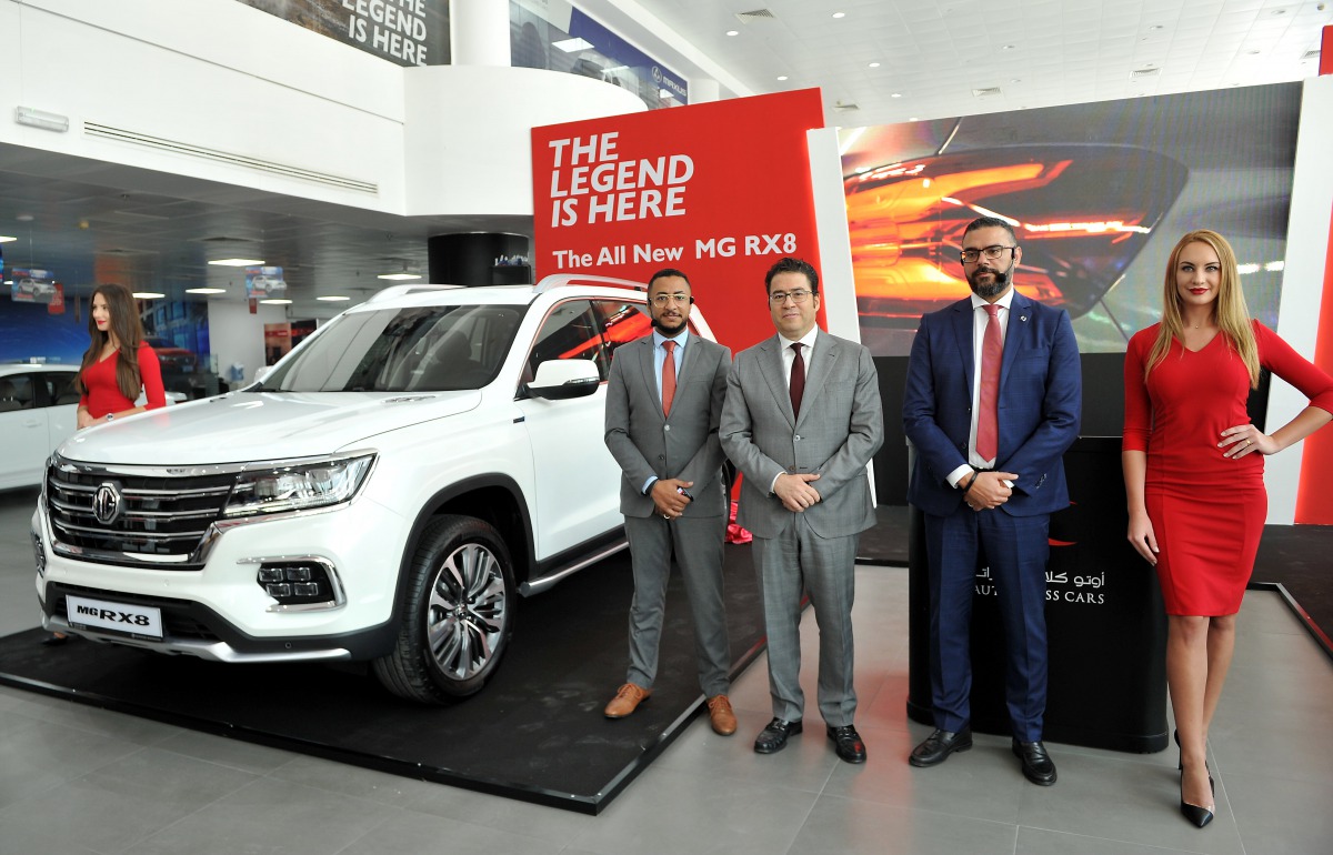 Ihab El Feky (centre), Chief Operations Officer, Nasser Bin Khalid (NBK) Group; Karim Monir (left), Head of Marketing, Auto Class Cars; and Tamer Abdallah, MG Brand Manager in Qatar; at the official launch of the new MG RX8 held at the MG Showroom in Doha