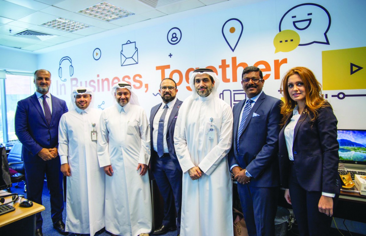 QFC CEO, Yousuf Mohamed Al Jaida (third left), and other officials during the Call Centre relaunch.