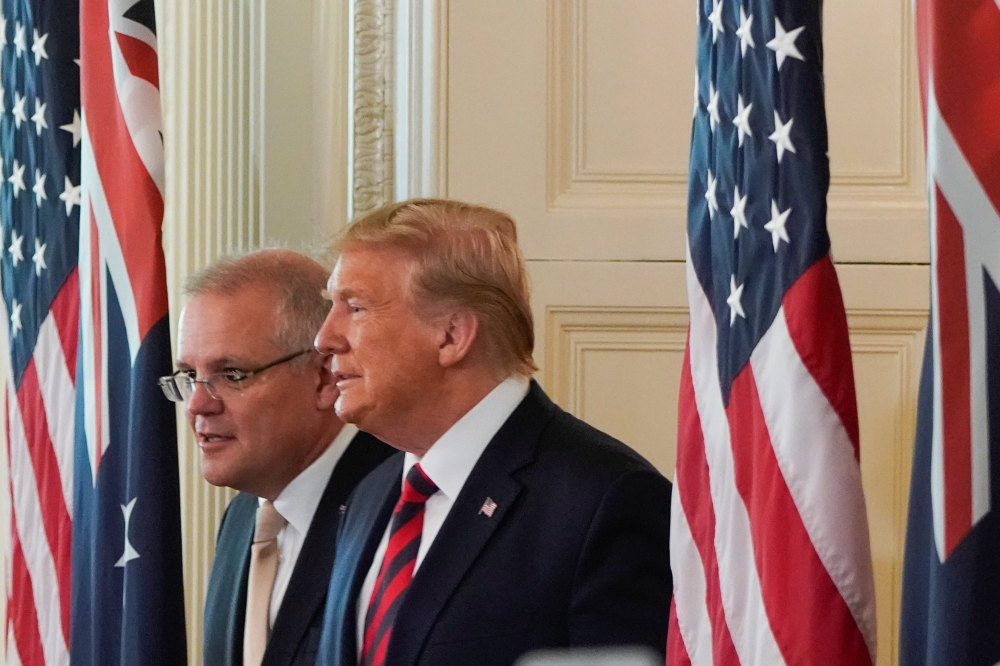 Australian Prime Minister Scott Morrison and US President Donald Trump arrive for a news conference in the East Room of the White House, September 20, 2019. Reuters/Joshua Roberts